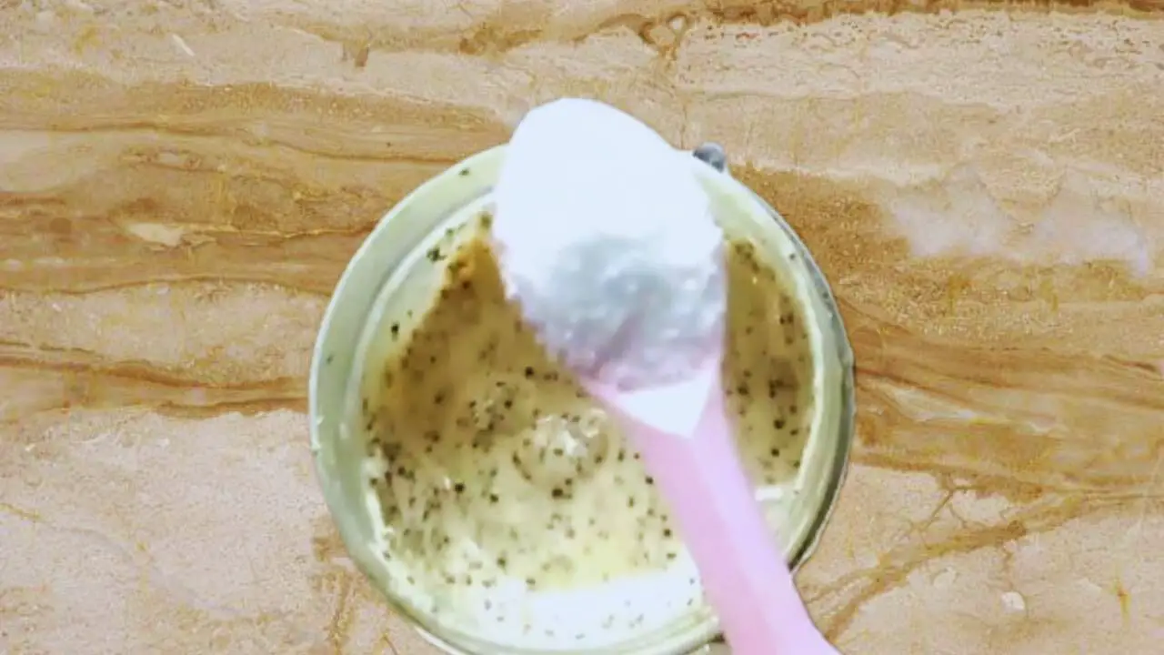 Adding 1 tsp of salt to the paste in the grinder