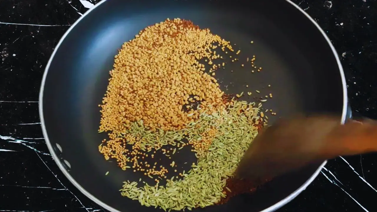 Dry roasting 2 tbsp fenugreek seeds, 2 tsp yellow mustard seeds, 1 tbsp brown mustard seeds and 2 tbsp fennel seeds