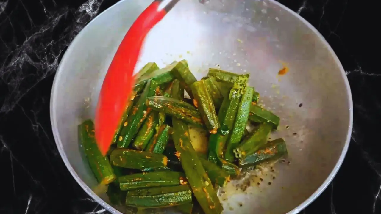Stir-frying the ladies' fingers