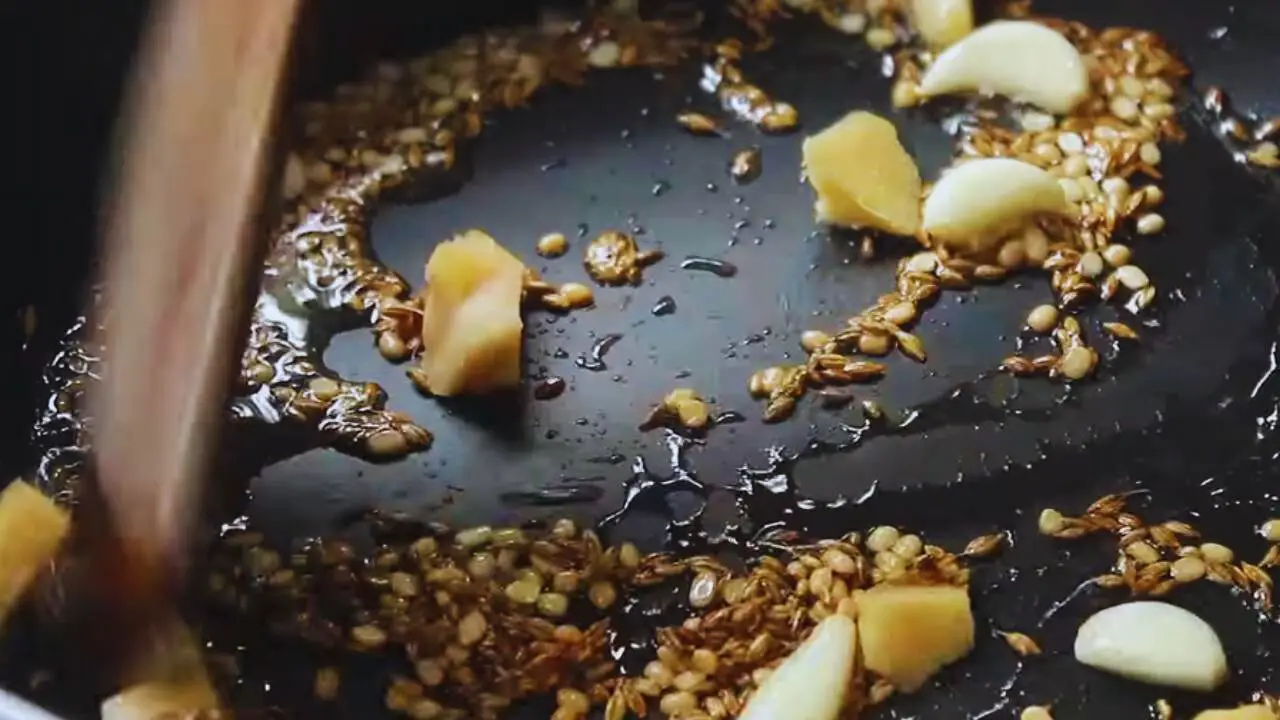 Giving the ingredients in the frying pan a nice stir