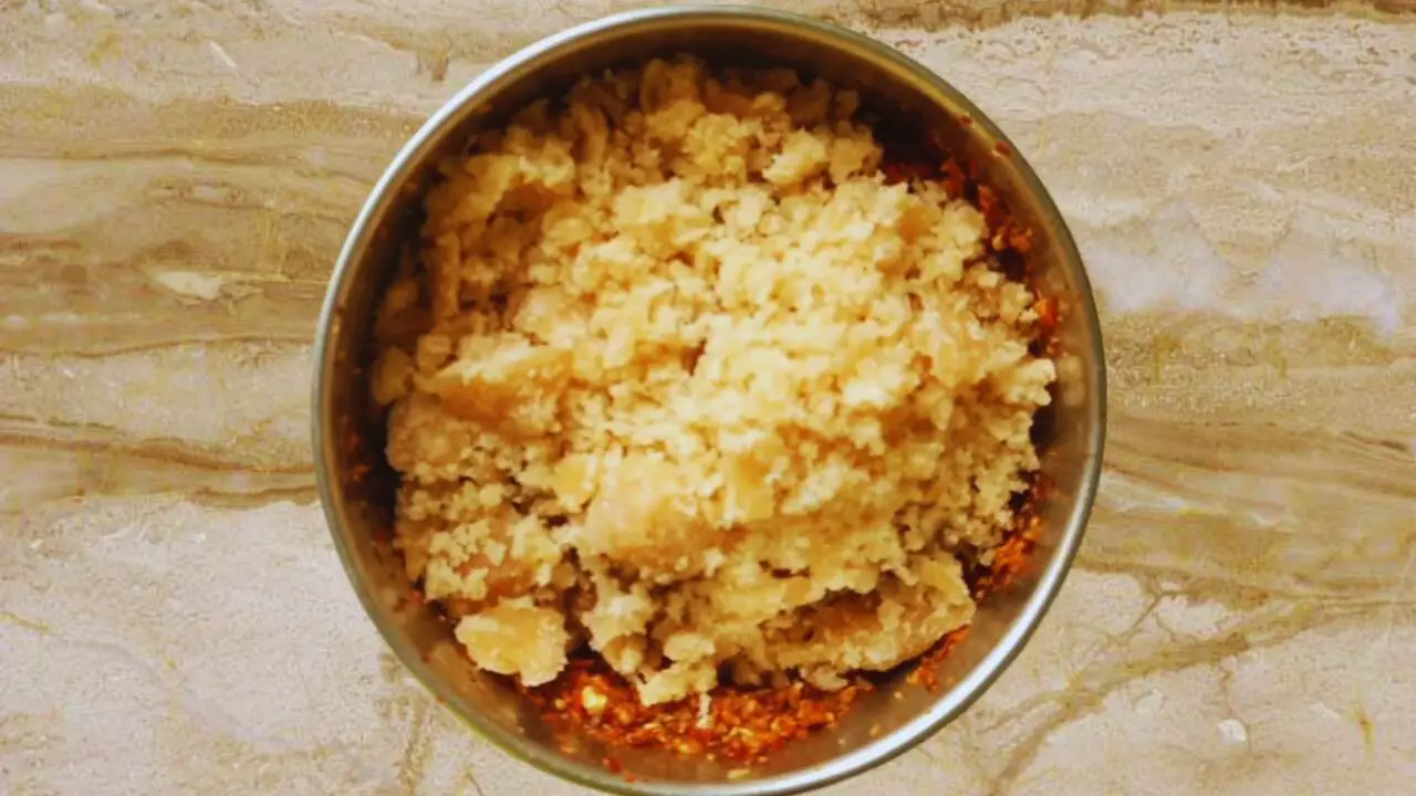 Adding ¼ cup of jaggery