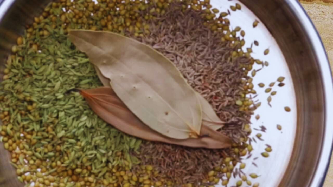 Adding 3 pieces of bay leaves