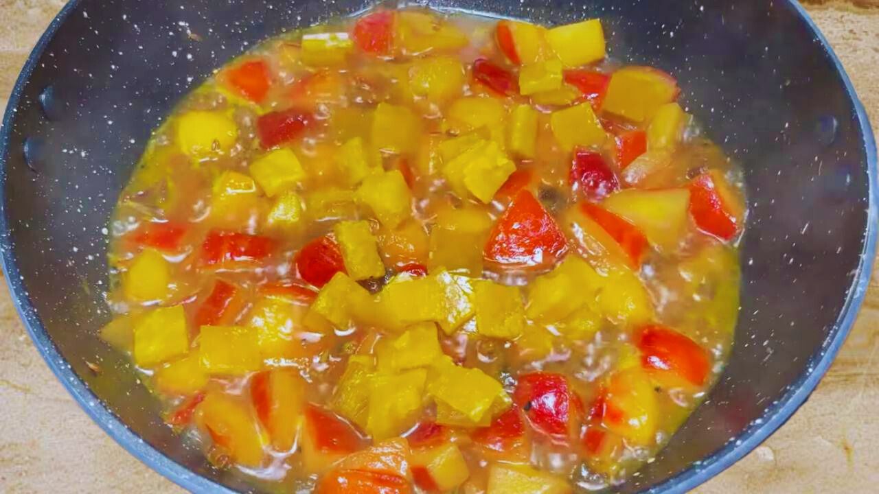 Added 70 gm of diced mango fruit leather (aam papad or amsotto) to the ingredients in the pan