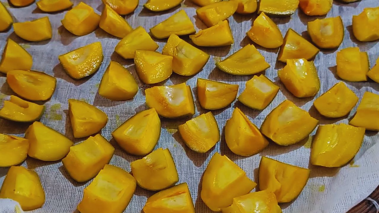 Sun-drying all the mangoes