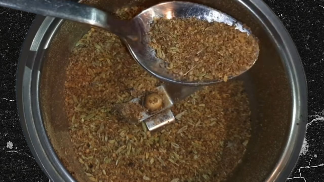 Grinding the spices into a coarse powder
