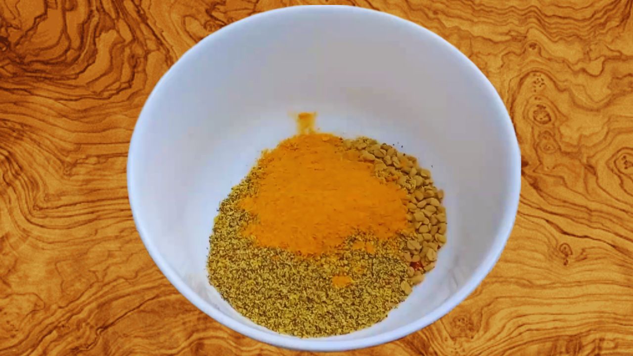 Combining 1 tsp salt, 1 tsp red chili powder, 1 tsp fenugreek seeds, 2 tsp mustard powder, and 1 tsp turmeric powder