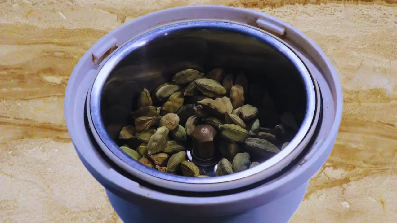 Cardamom in grinder