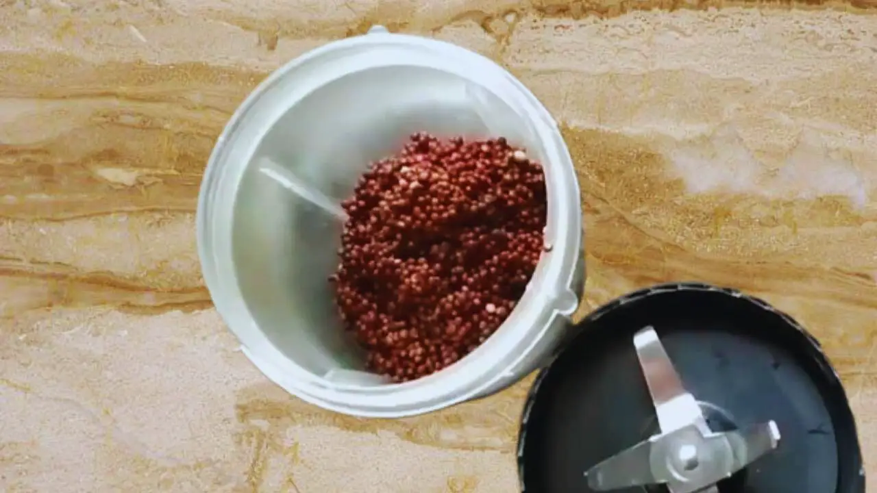 Mustard seeds in grinder