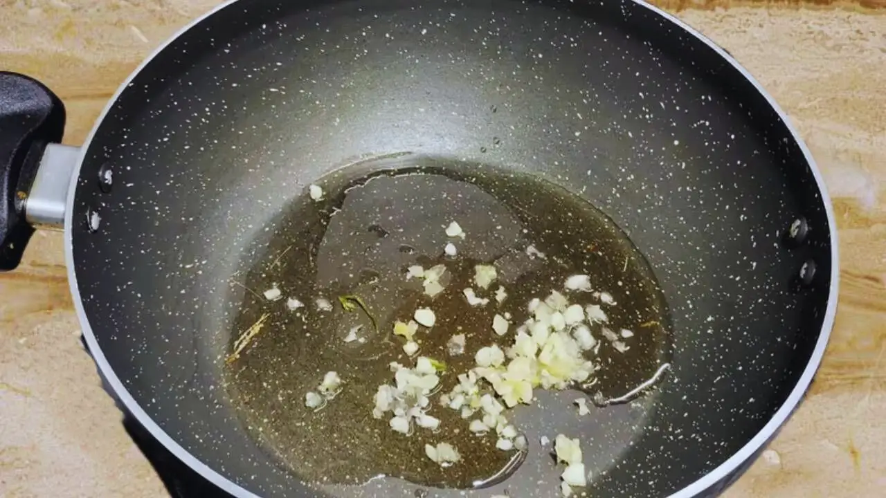 Adding garlic to make vegetable kabab