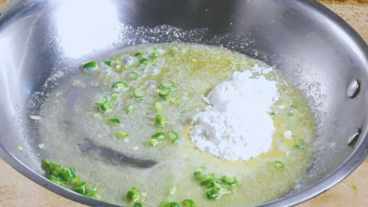 Adding maida at this stage of the chicken finger mixture 