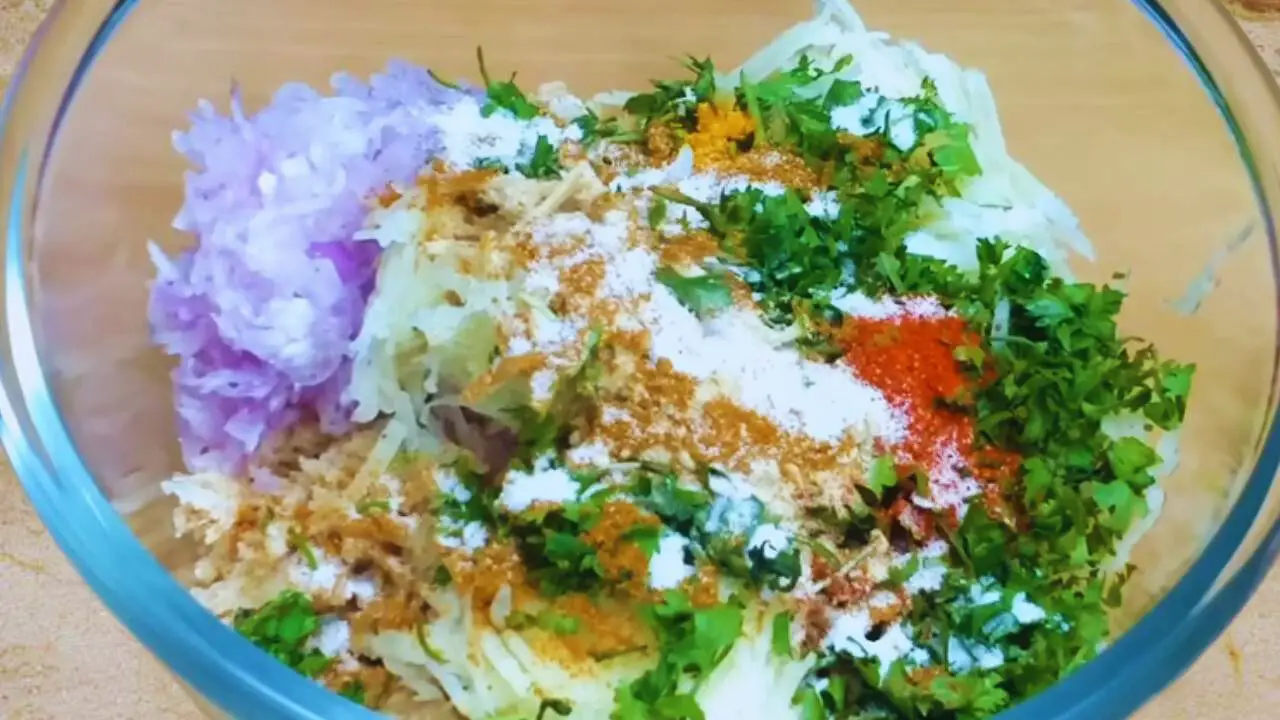 Adding powder ingredients to soyabean kabab paste