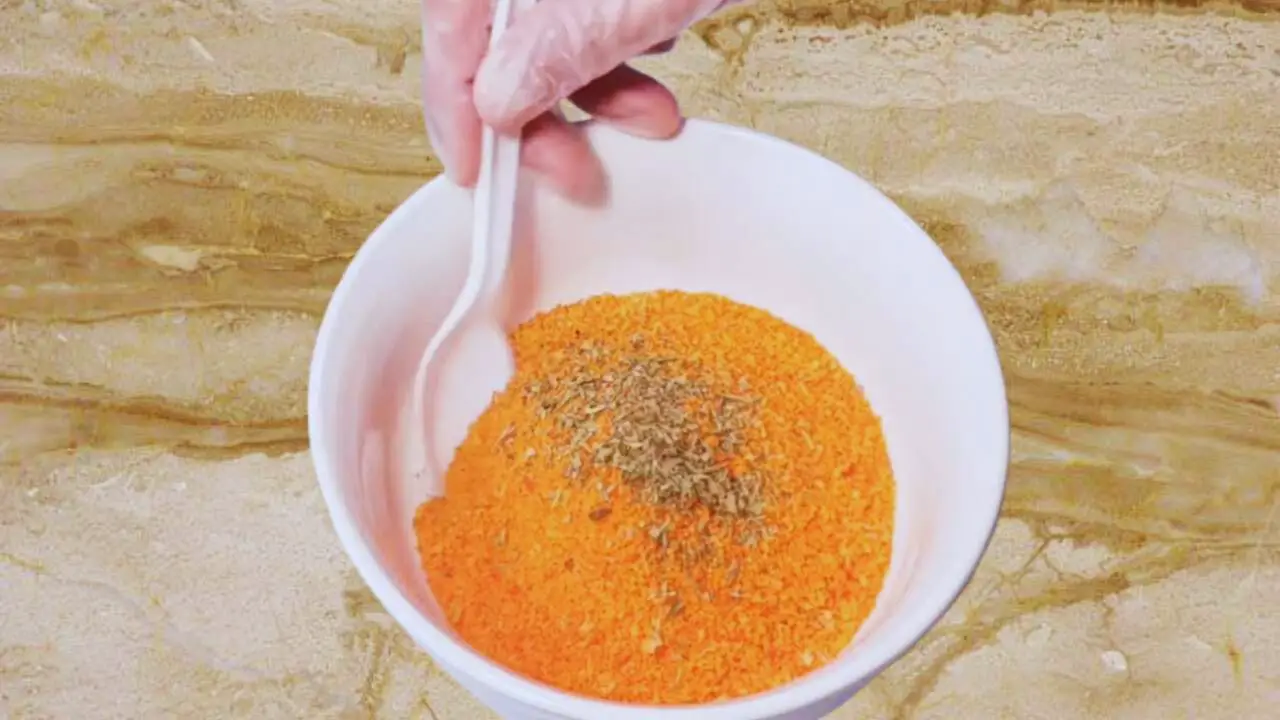 Bread crumbs and herbs to coat cheese stick