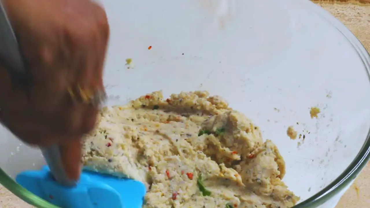 Mixing the chicken finger mixture 