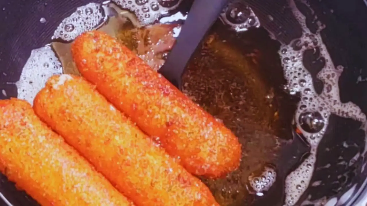 Removing fried cheese sticks