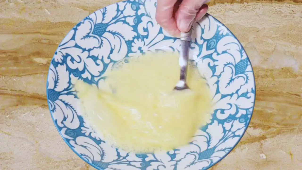 The egg wash to coat cheese stick