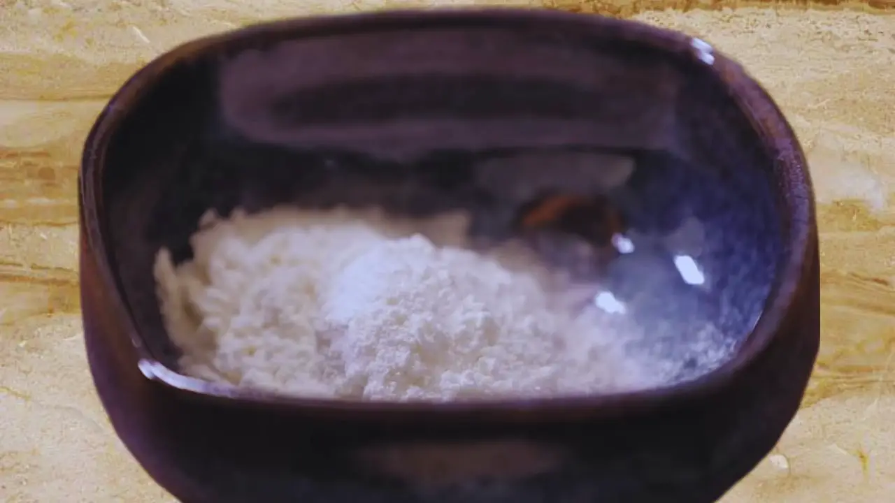 Maida in a bowl to make the slurry for coating beetroot cutlet 