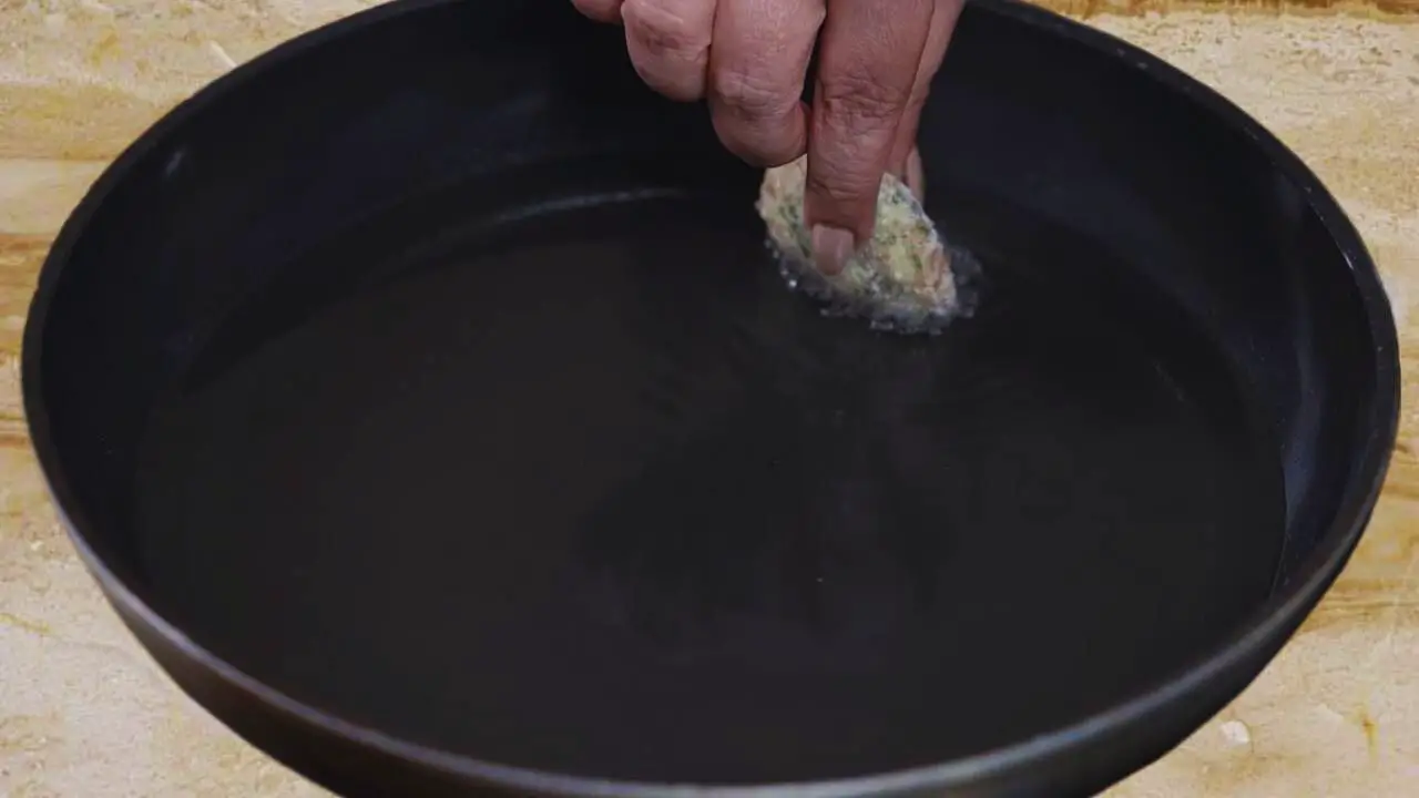 Frying sweet potato tikkis