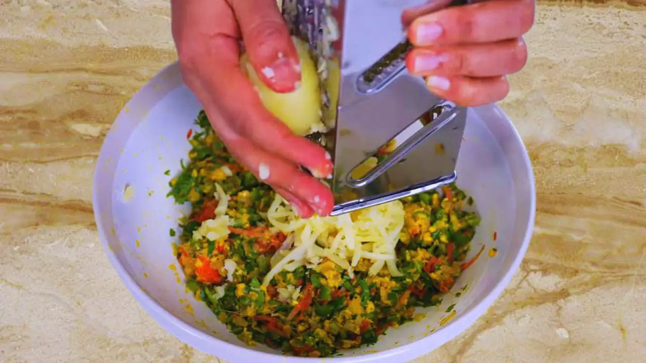 Add grated potatoes