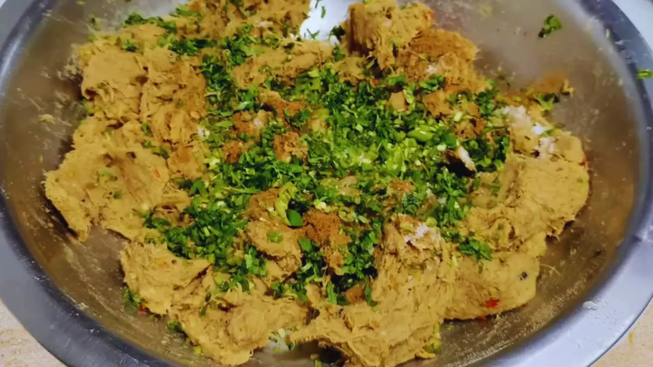 Add other ingredients to mutton kabab mixture 