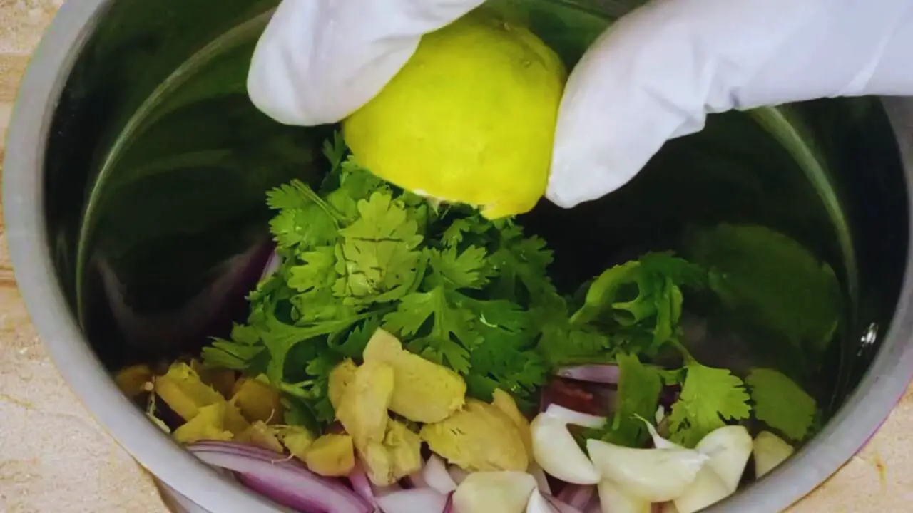 Adding all ingredients of mutton lollipop
