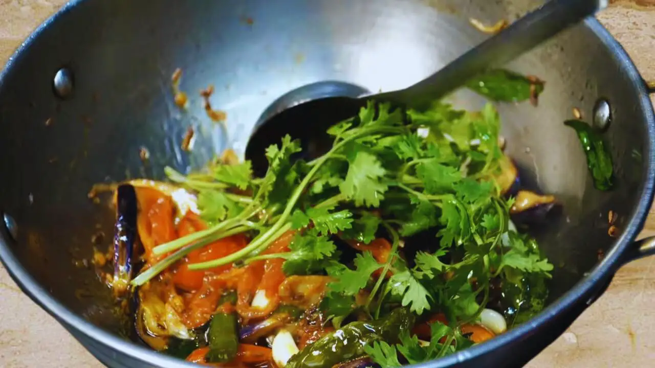 Adding coriander leaves 