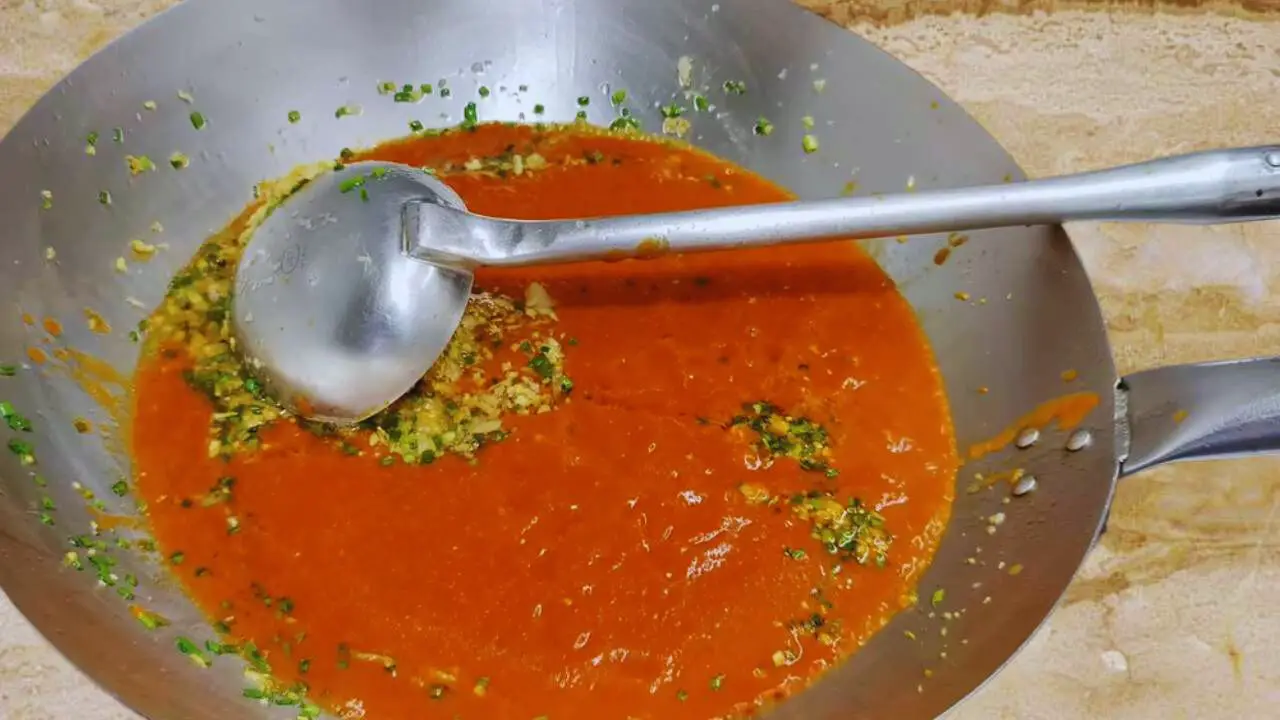 Adding Momos Chutney paste