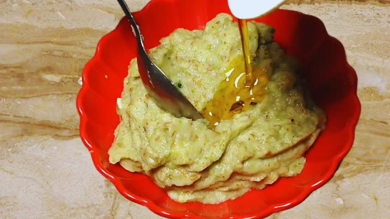 Adding mustard oil to Ber Ki Chutney paste 