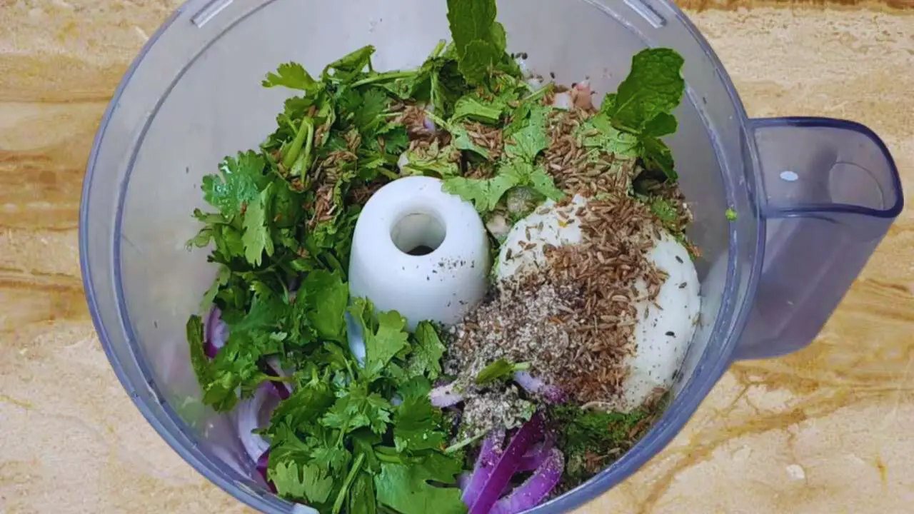 Adding other ingredients of prawn kabab 