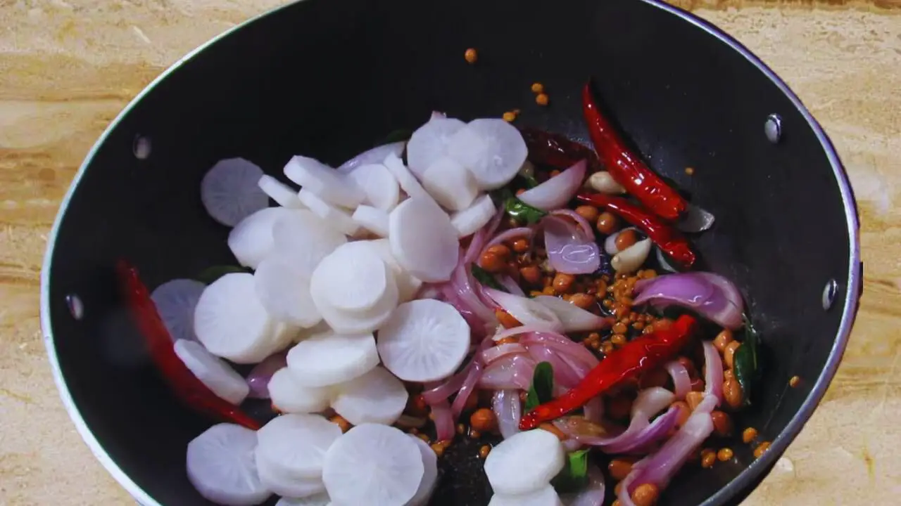 Adding radish pieces