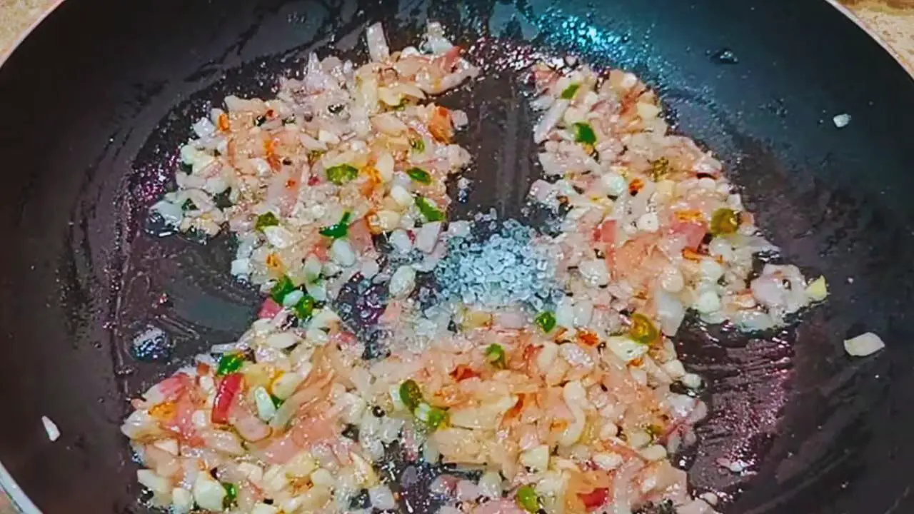 Adding sugar to Fish Momo sauce ingredients 