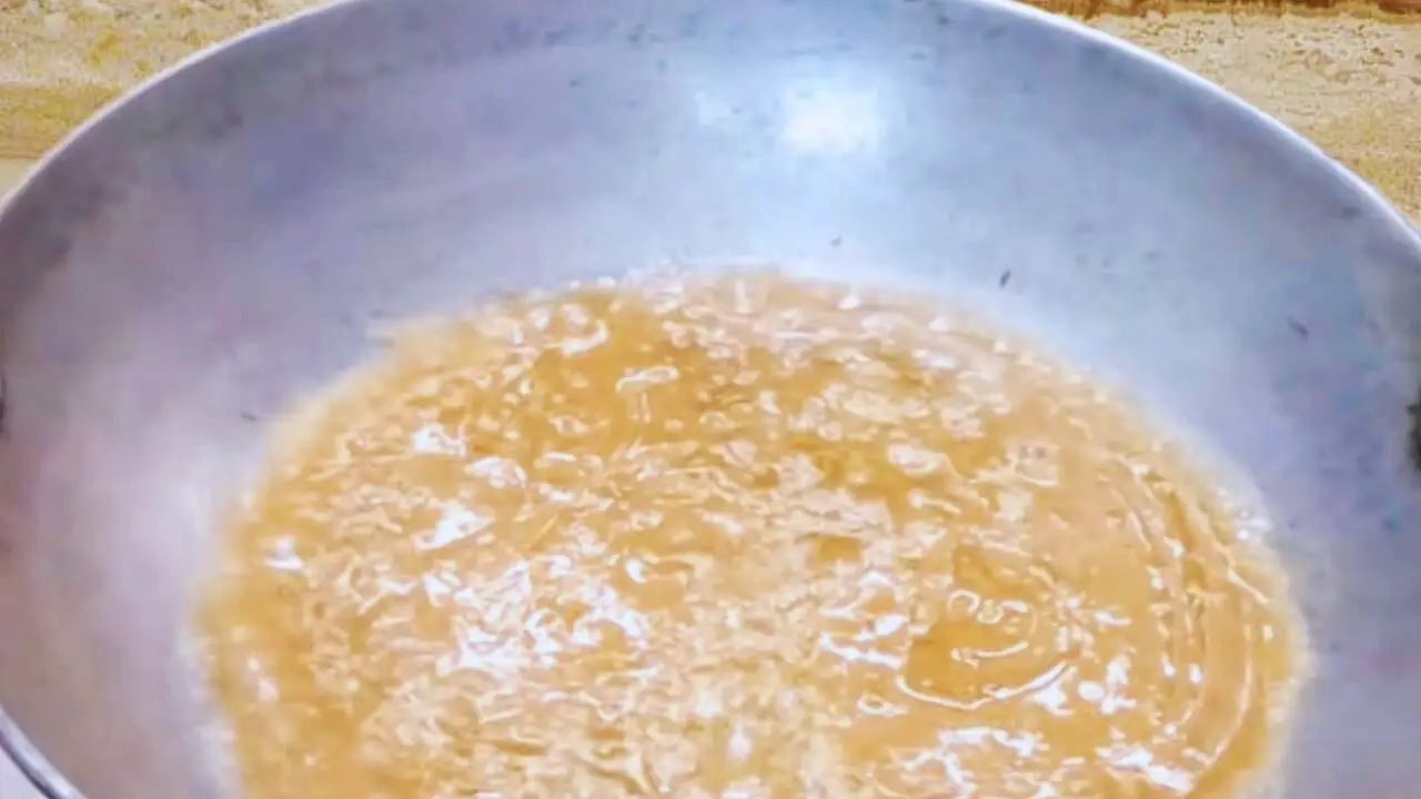 Adding tamarind chutney paste 