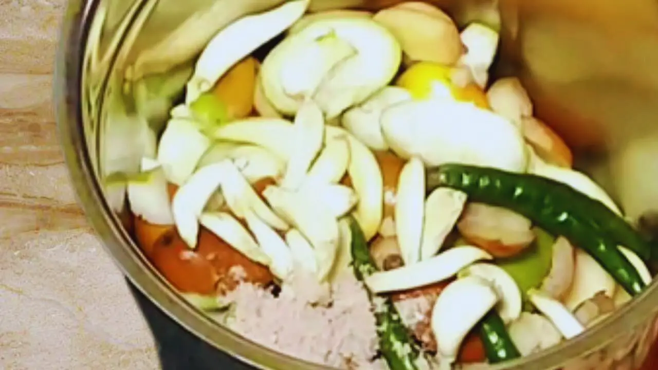 Adding the ingredients to ber to make the chutney 