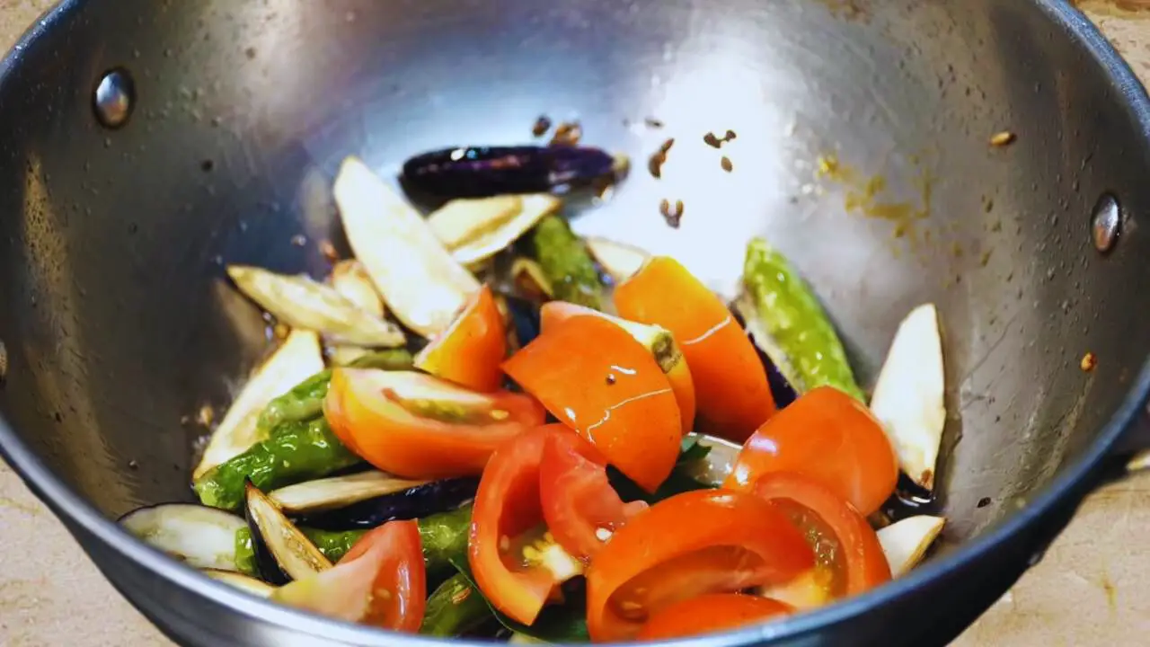 Adding tomatoes 