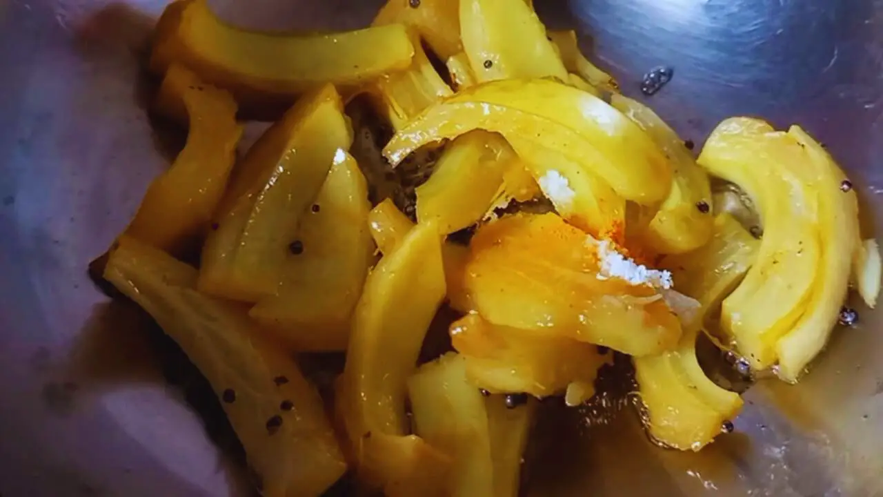Adding turmeric and salt