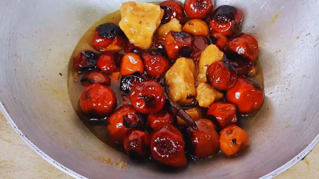 Adding water to Ber Ki Chutney 