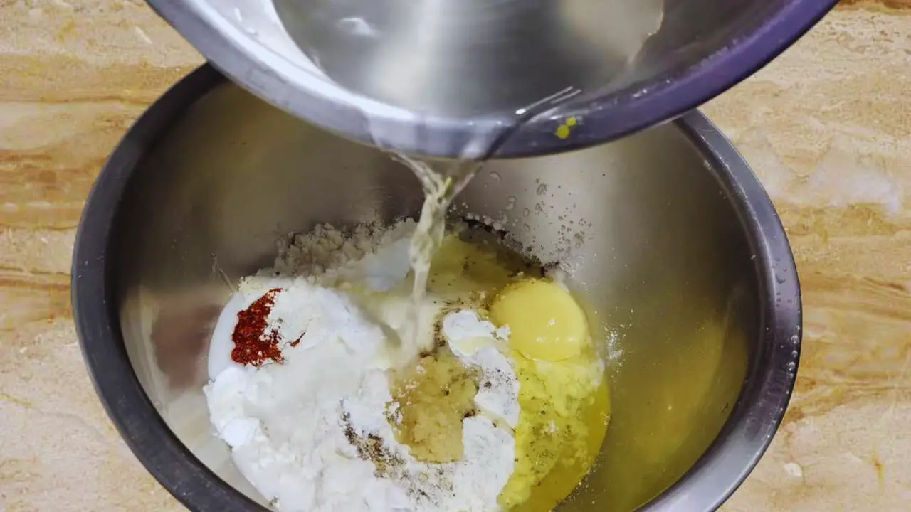 Adding water to the batter 