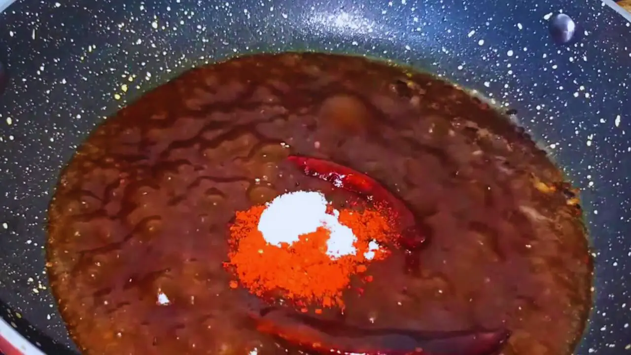 Chili powder added to make banana chutney 