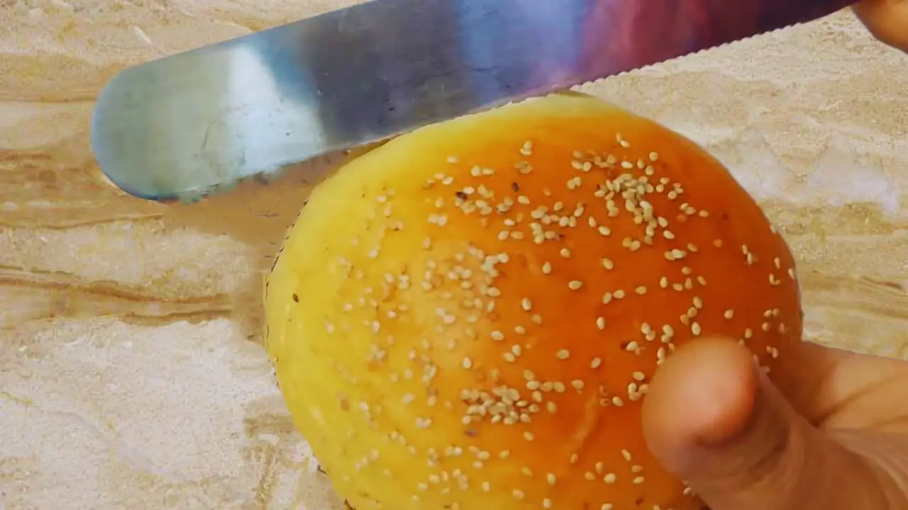 Cutting a burger bun in half
