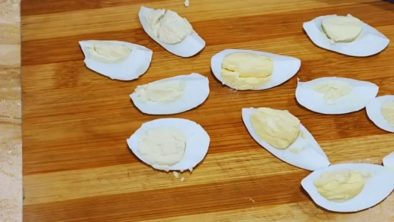 Egg pakora recipe step 6 Cutting eggs for making pakoras