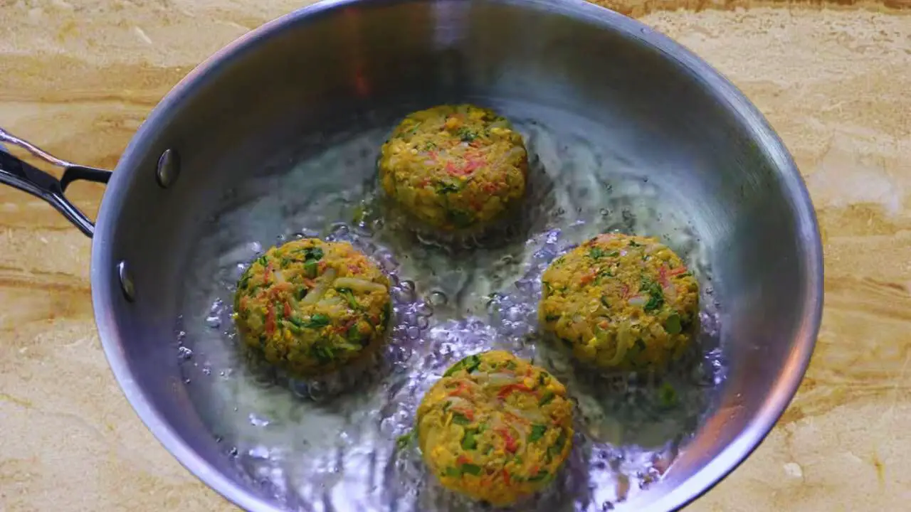 Frying corn tikkis 