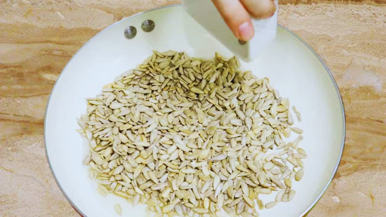 Sunflower seeds chutney recipe step 2 Frying sunflower seeds to make the chutney