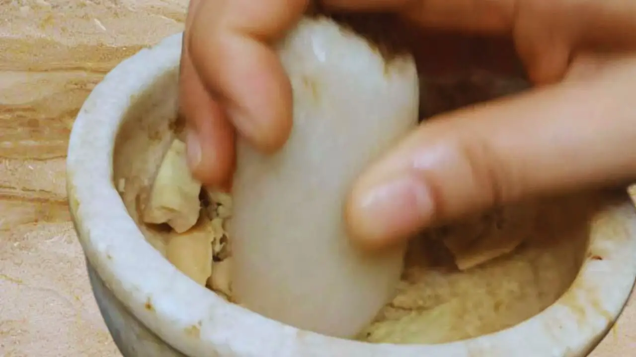 Grinding ginger 