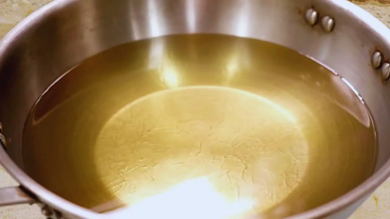 Heating oil to fry Vegetable Pakora