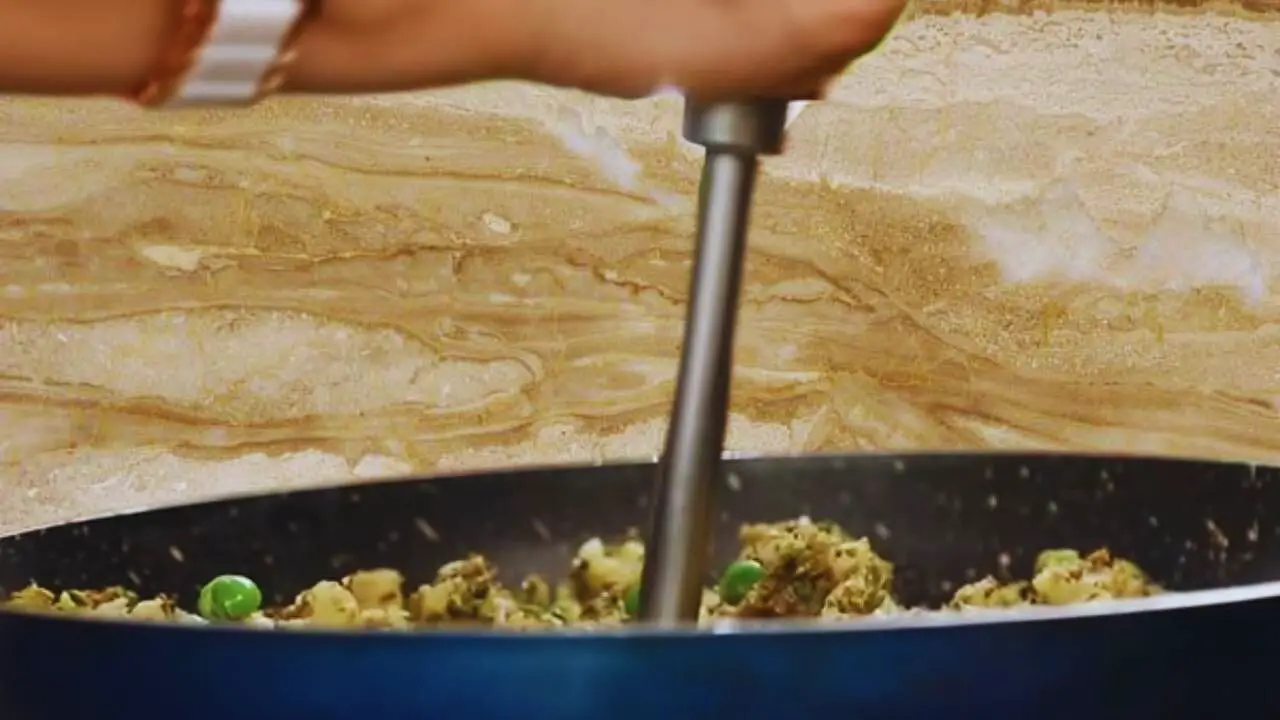 Mashing Bread Samosa mixture 