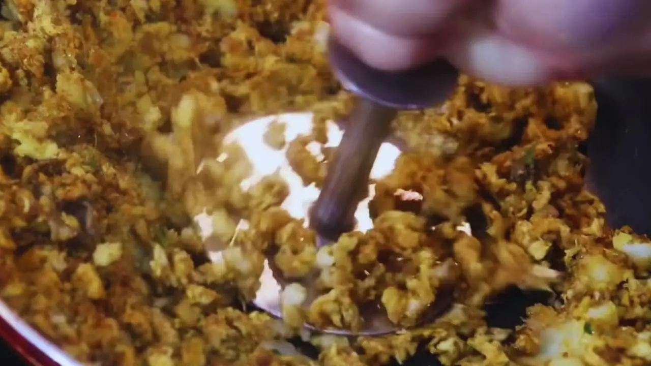 Mashing Fish Chop ingredients 
