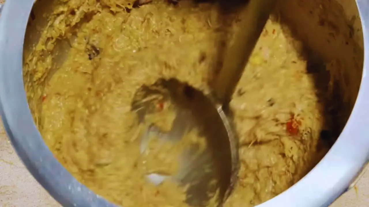 Mashing mutton kabab mixture 