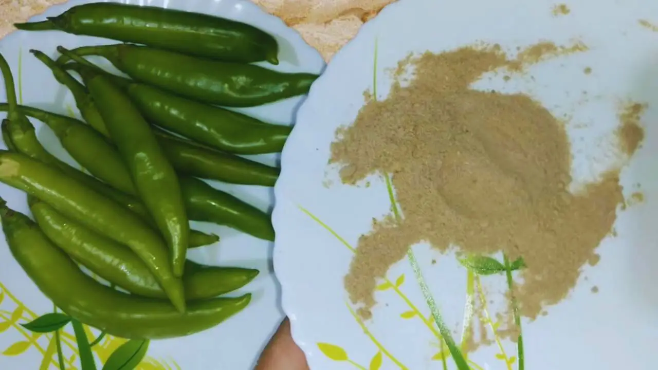 Mixing amchur and salt to make Chili Pakora