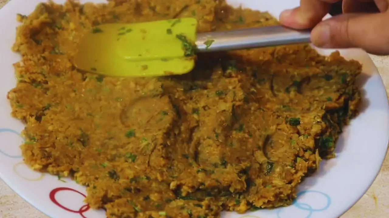 Mixing Fish Chop ingredients 