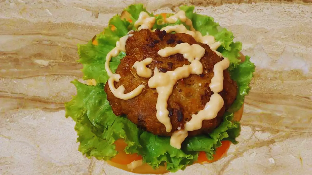 Placing the mutton patty 