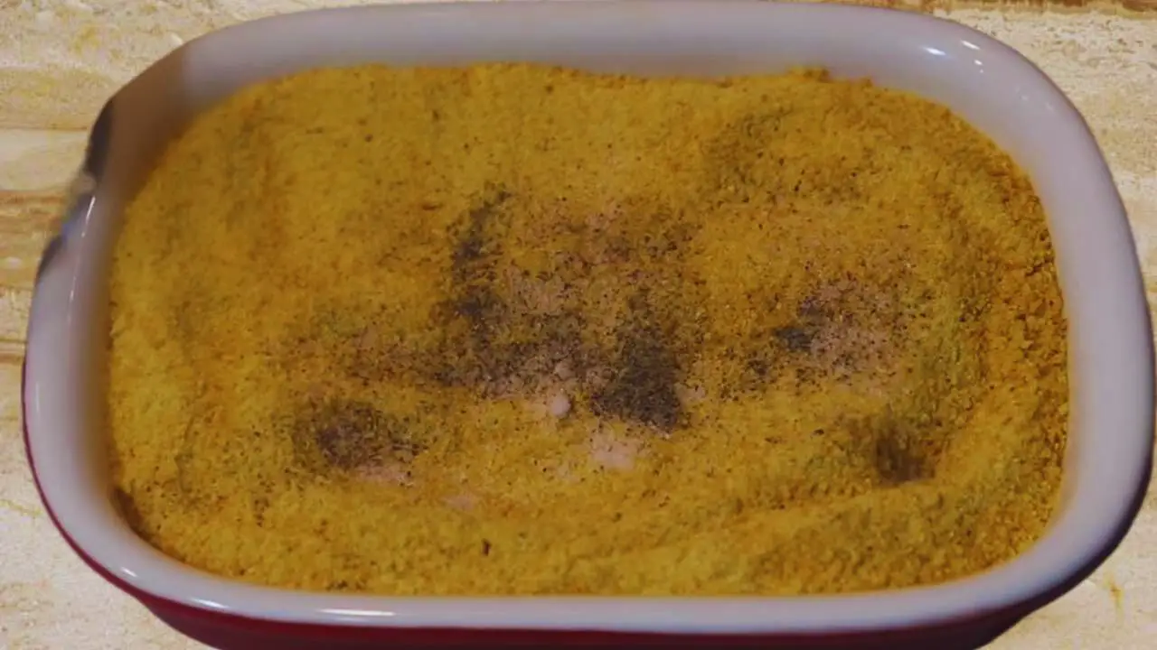 Preparing bread crumbs to coat Fish Chops 